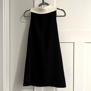 Alice + Olivia black dress with wide white collar. Black zipper down the back!